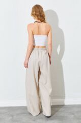 Beli Lastikli Paça Geniş Dikiş Detaylı Ekru Pantolon
